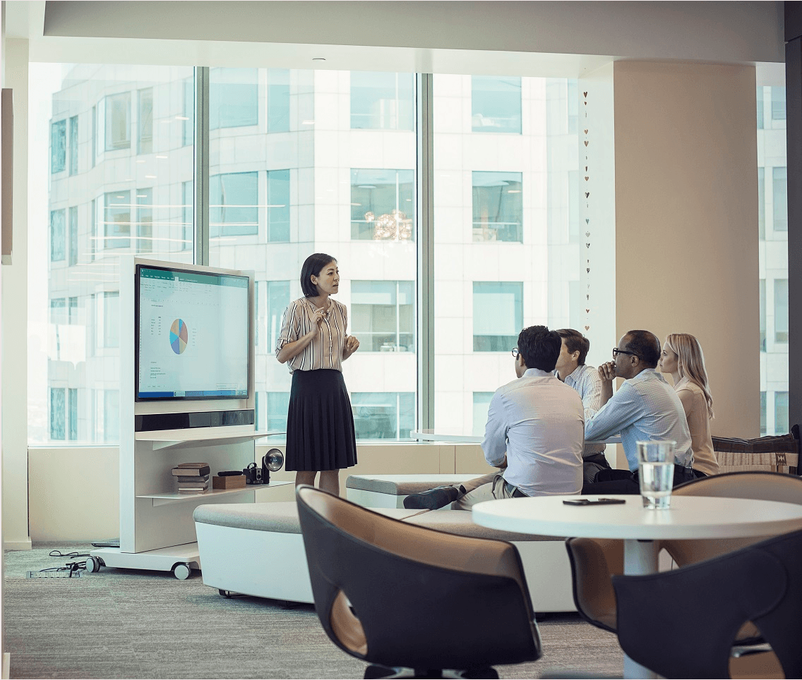 KIM & CHO professional presenting IP strategy to colleagues in a modern office meeting